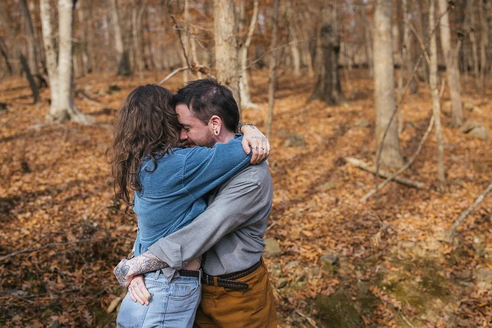 Couple Hugging in Woods in Durham NC