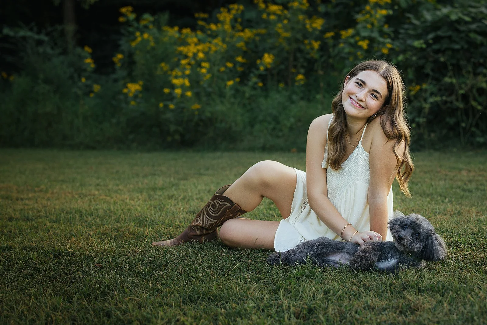 Senior Girl Sitting in Grass with Dog Blackwood Farm Park