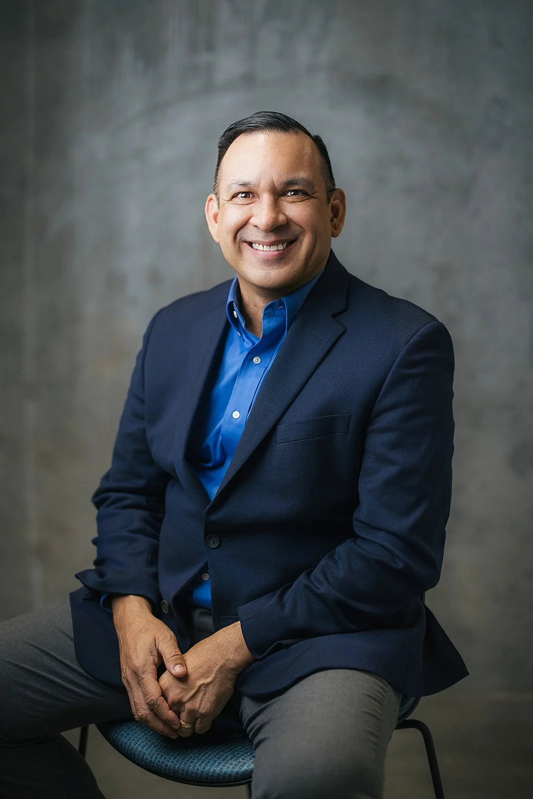 Downtown Durham Professional Headshot Man Sitting on Stool