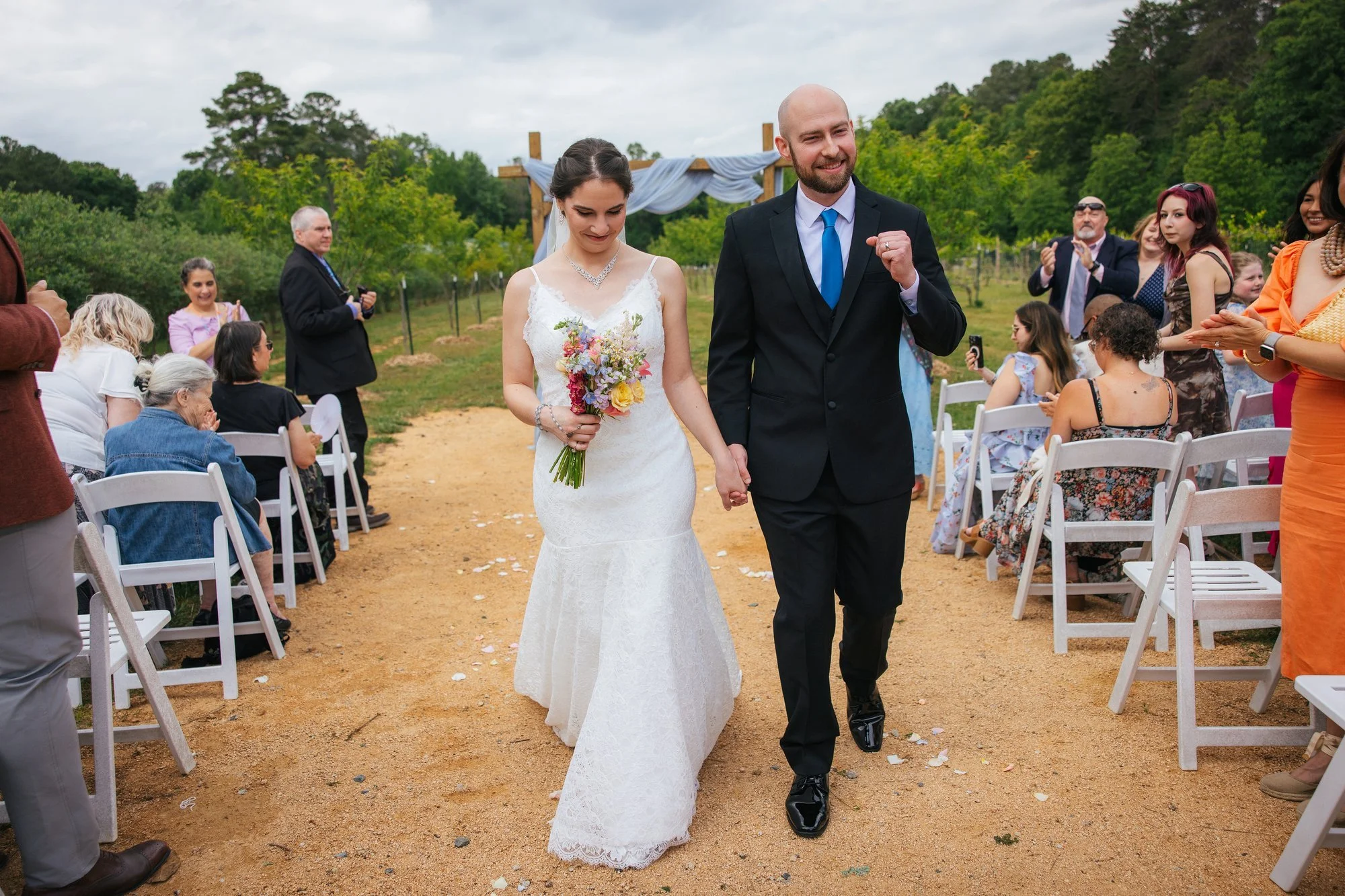 Bea and Tim walking together after their ceremony — Chapel Hill NC wedding