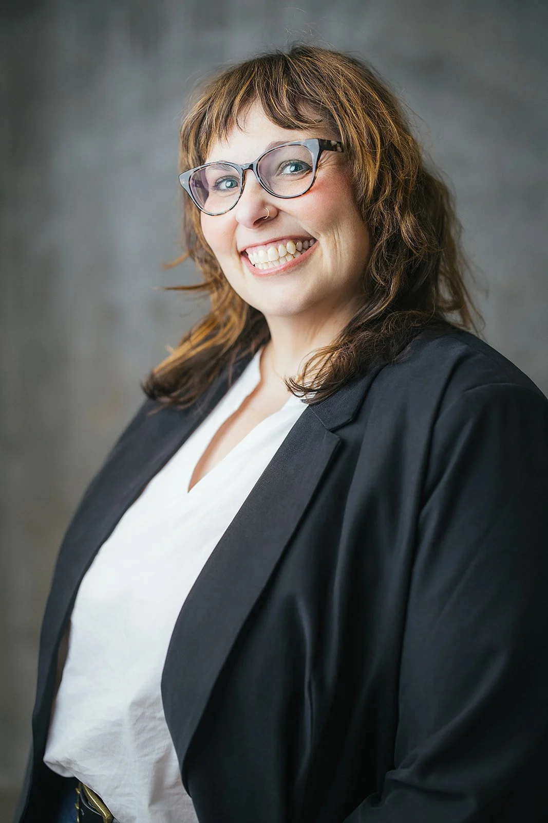Woman in Black Blazer Smiling Professional Corporate Headshot