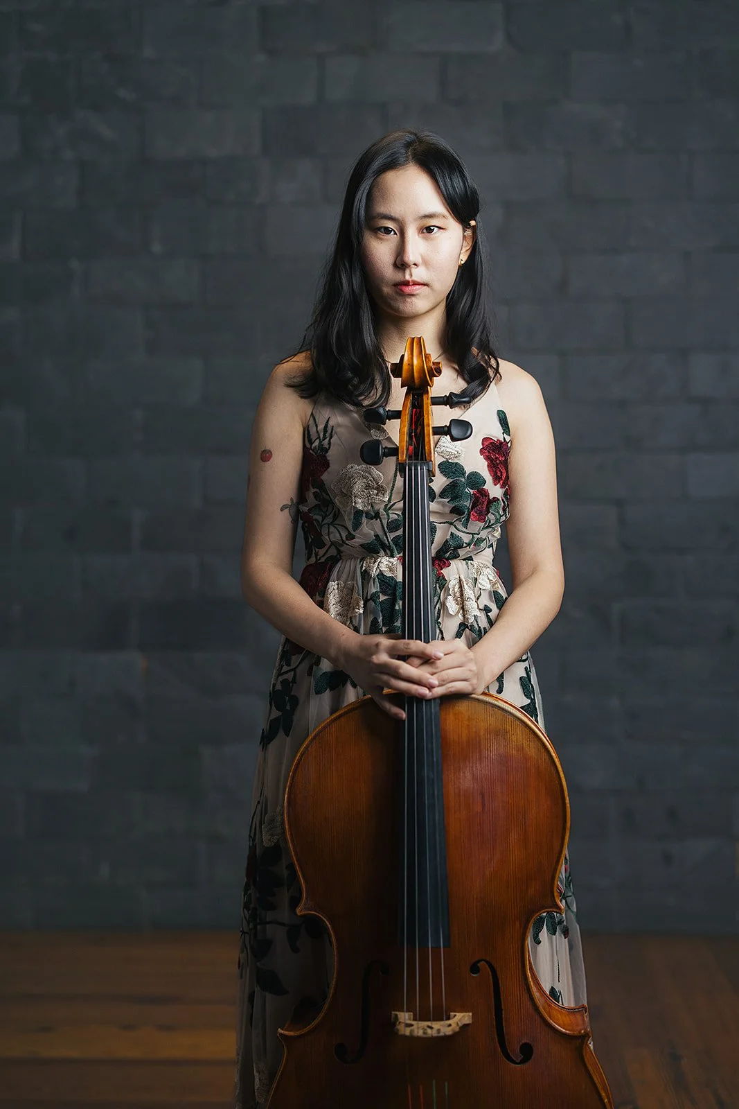 Member of Chamber Orchestra of the Triangle Holding Cello