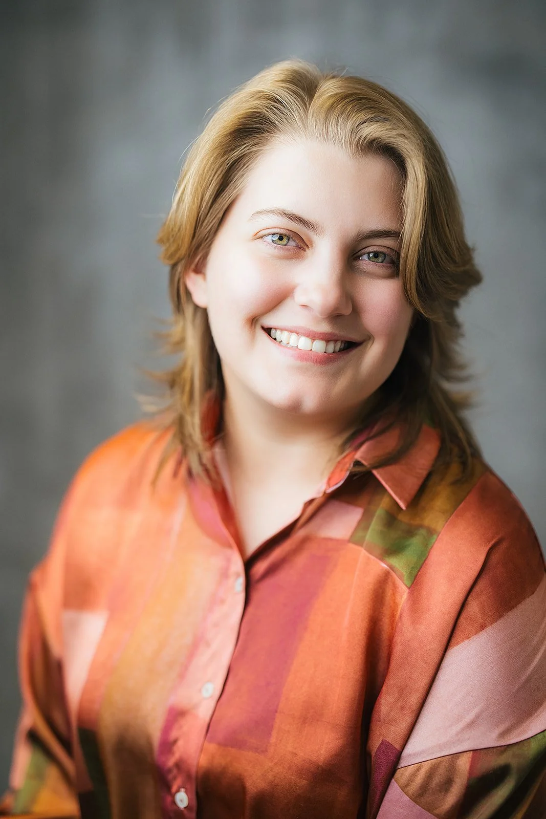 Woman Smiling During Corporate Headshot Session in Durham NC