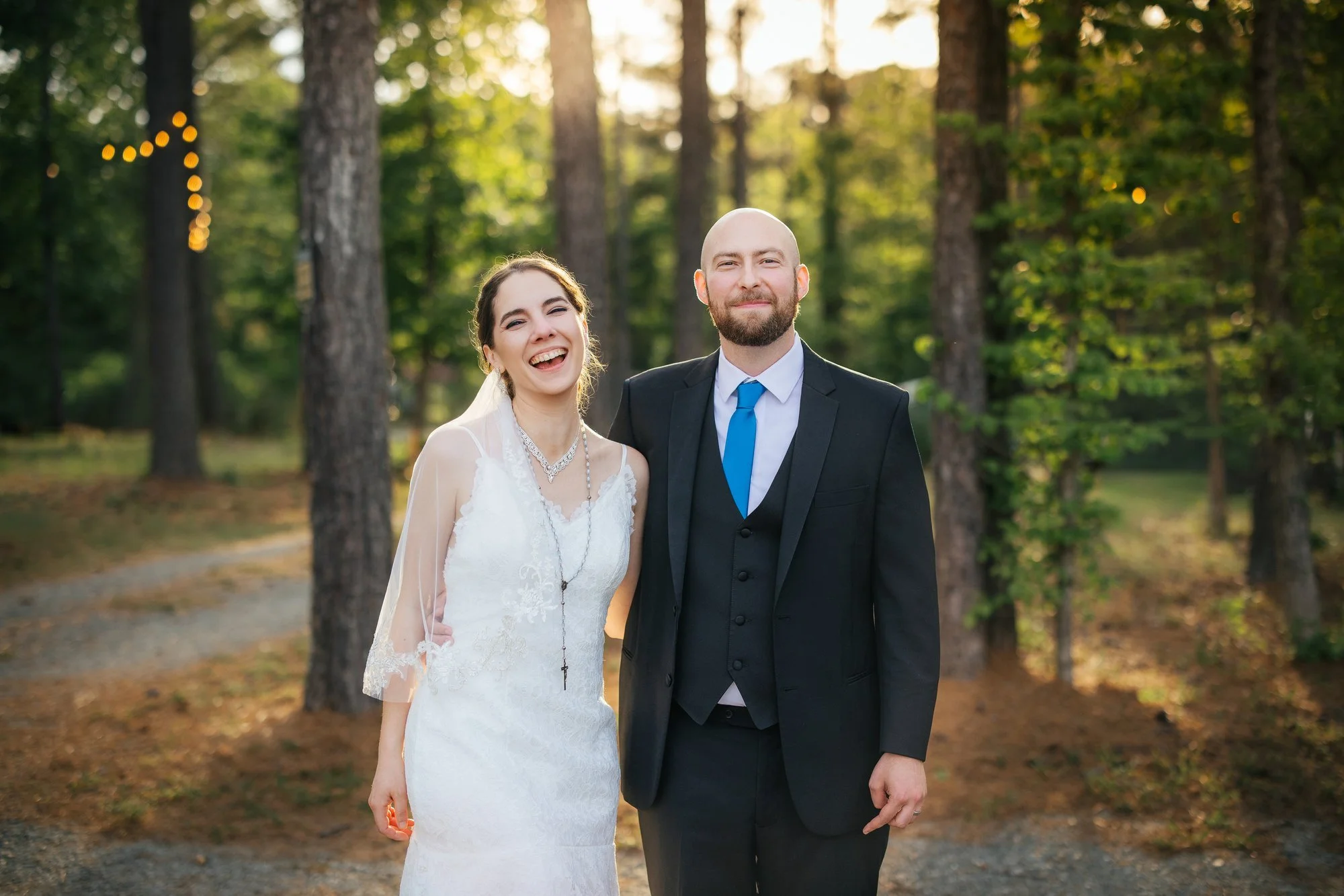 Bride and groom laughing together — Durham wedding photographer