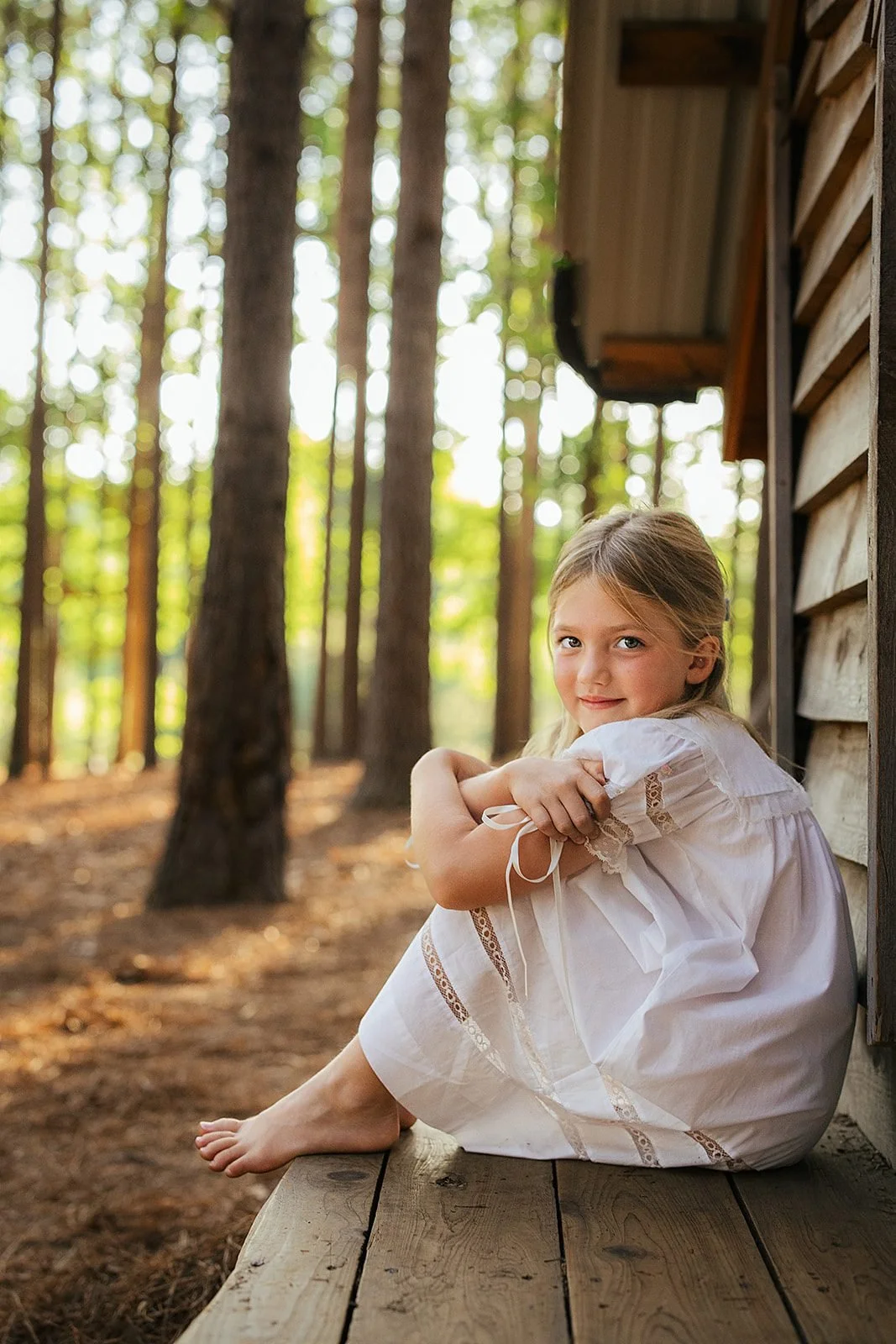 Little girl looking off-camera in golden hour light, Hillsborough North Carolina