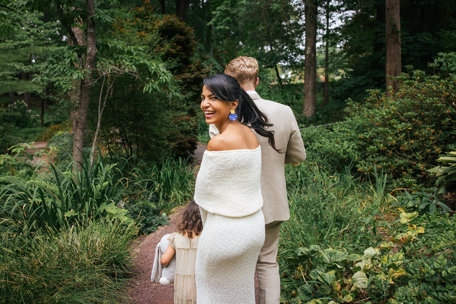 Family of four explores Duke Gardens during a Durham, NC family photoshoot