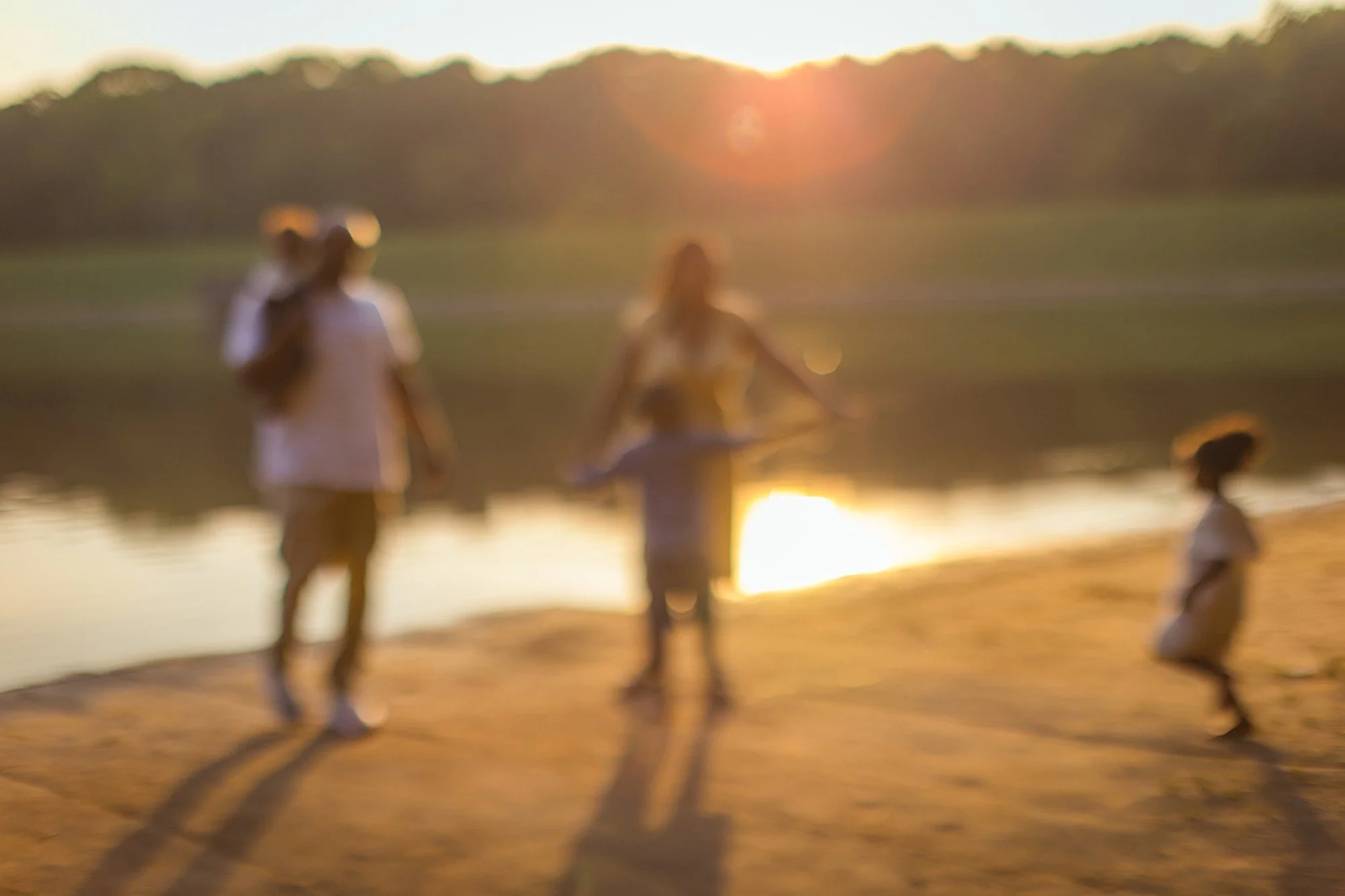 family photos with hazy sun during summertime in Durham NC