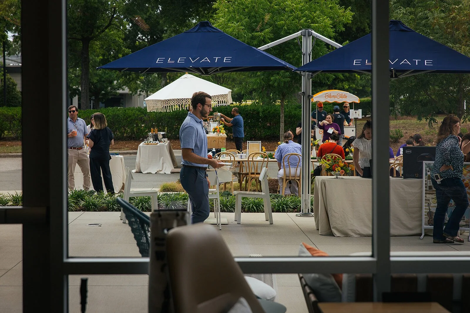 Landscape Photo of People Interacting at Raleigh Event