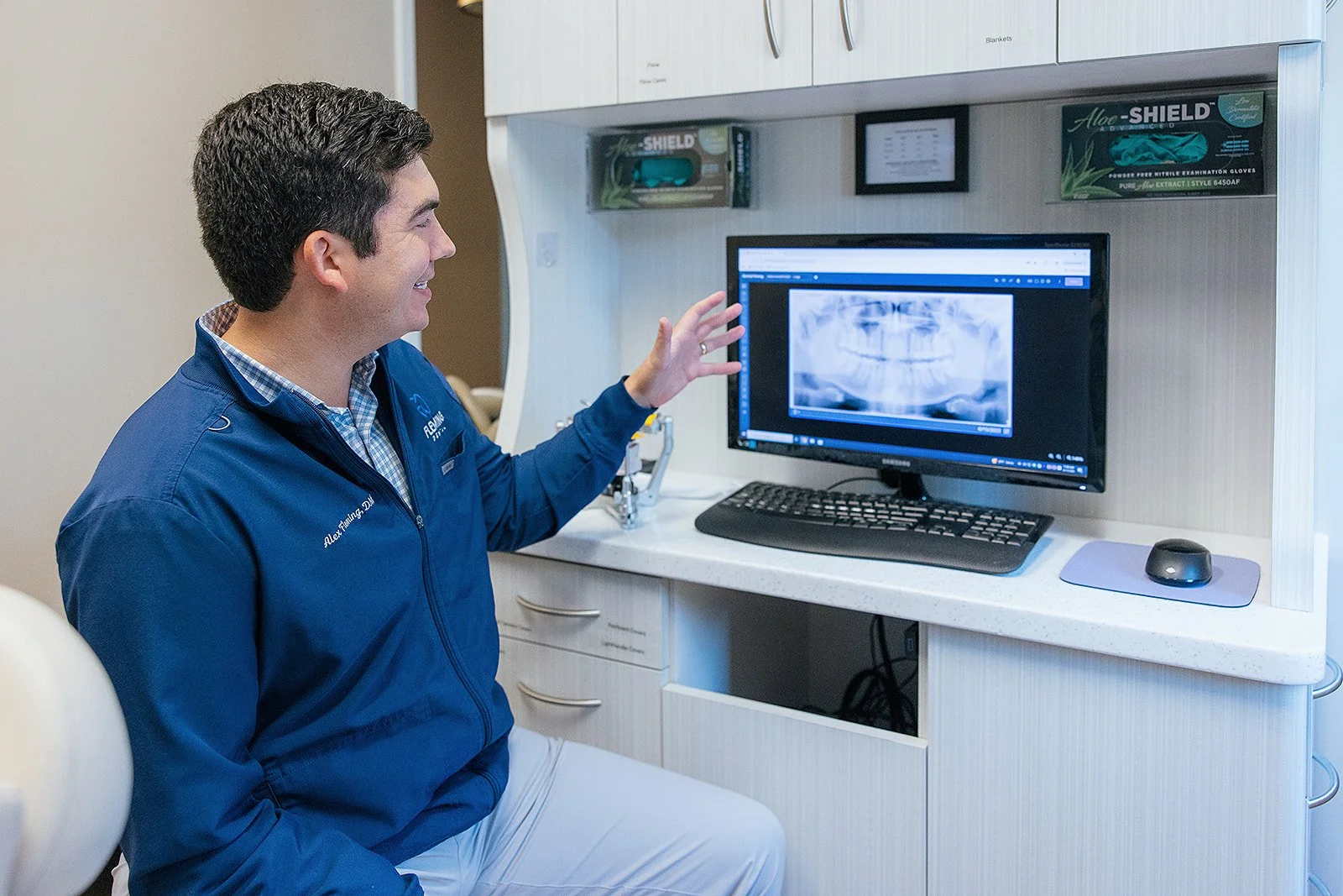 Dentist Showing XRay Dental Branding Photography Session Durham NC