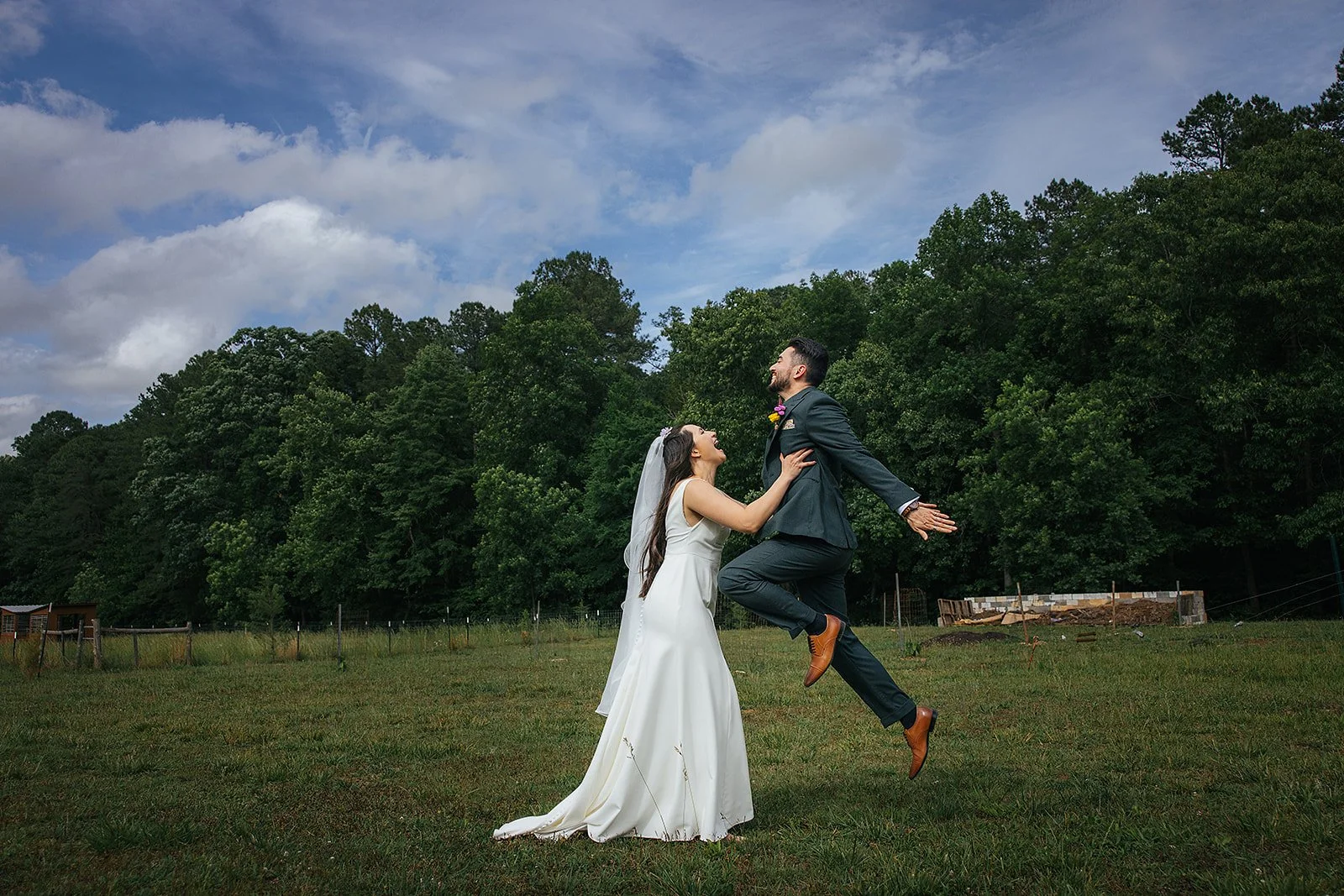 Candid wedding photography Durham NC — couple celebrating