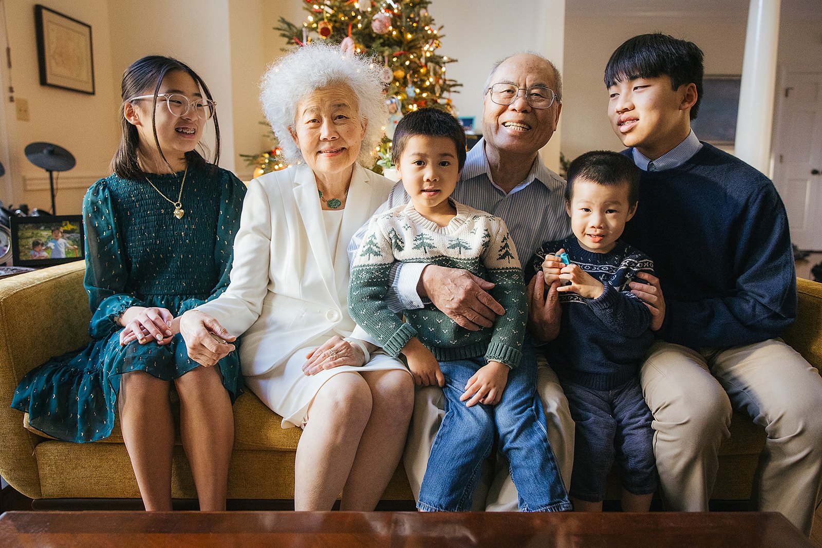 Family Portrait at Christmas time in front of tree Durham NC