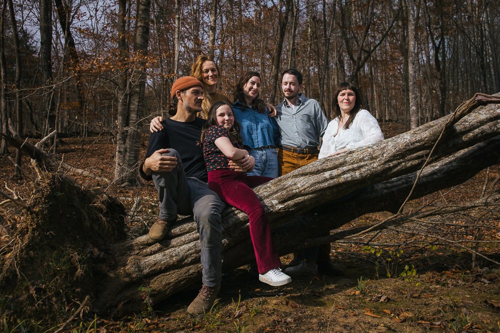 Friends Outside on Log During Family Portrait Session Durham NC