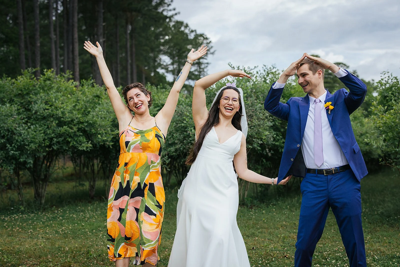 Wedding guests laughing at Honeysuckle Tea House Chapel Hill