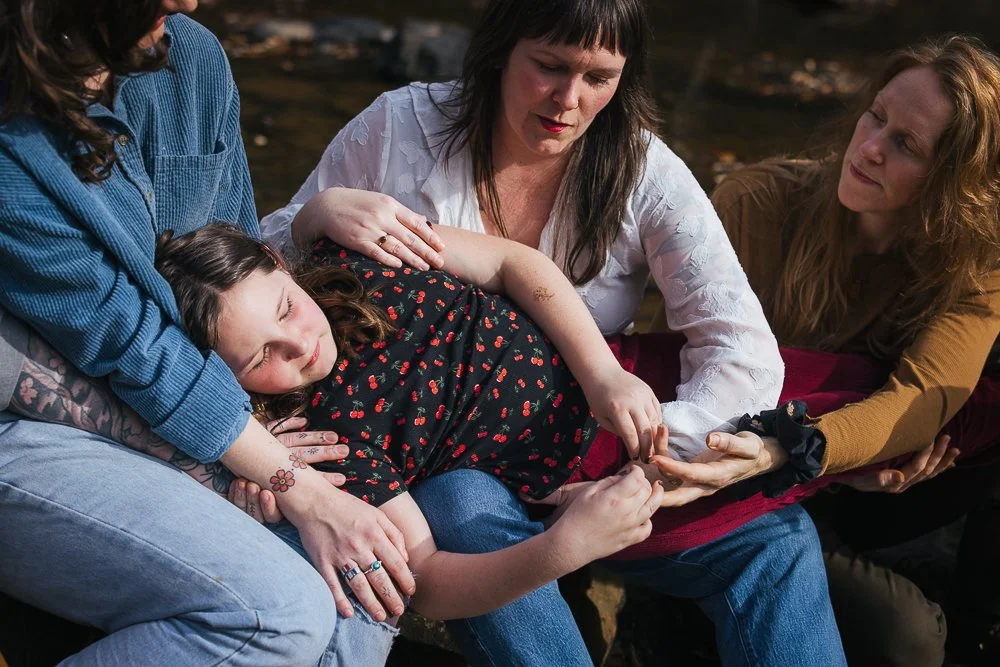 Girl Sitting with Friends Outside Durham NC