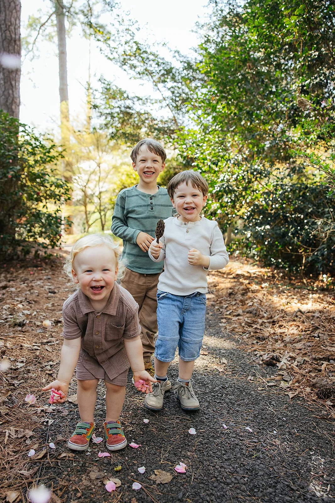 Three Young Boys Running Through Paths At Duke Gardens During Family Photography Session