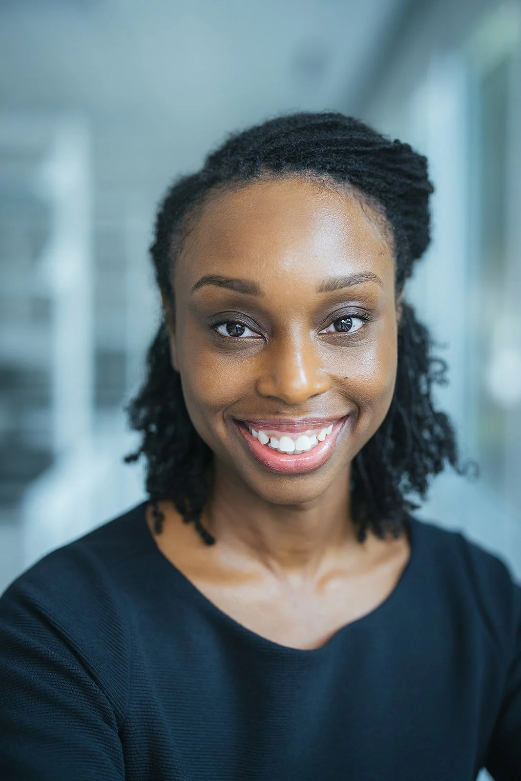 WomanHeadshotInBlackShirt