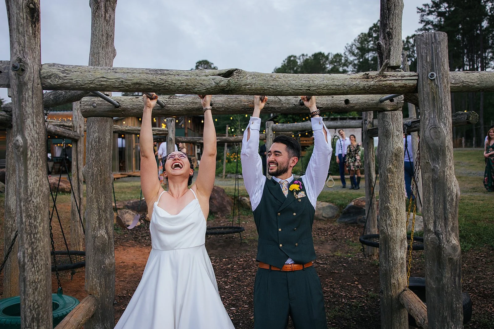 Chapel Hill NC wedding reception — bride and groom having fun
