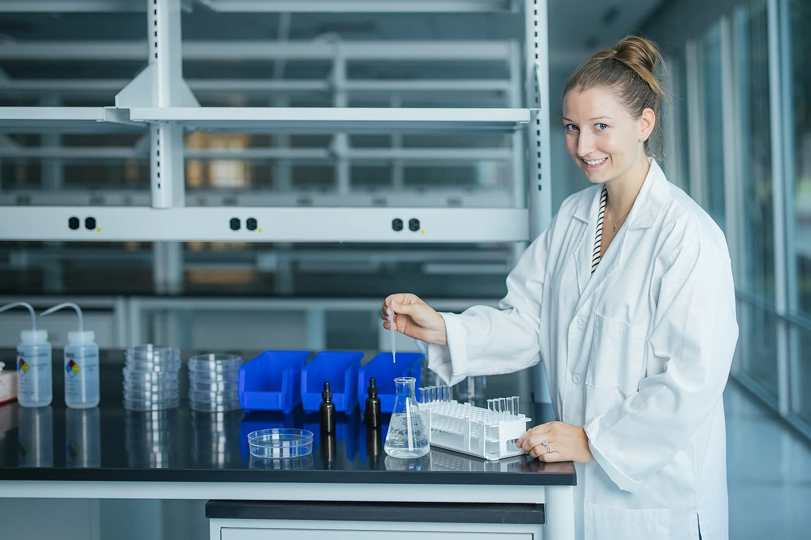 WomanInLabCoatWorkingInLab