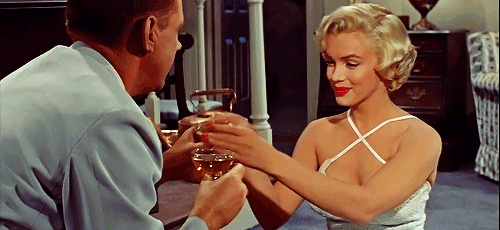 Marilyn-Monroe-champagne-toast.gif
