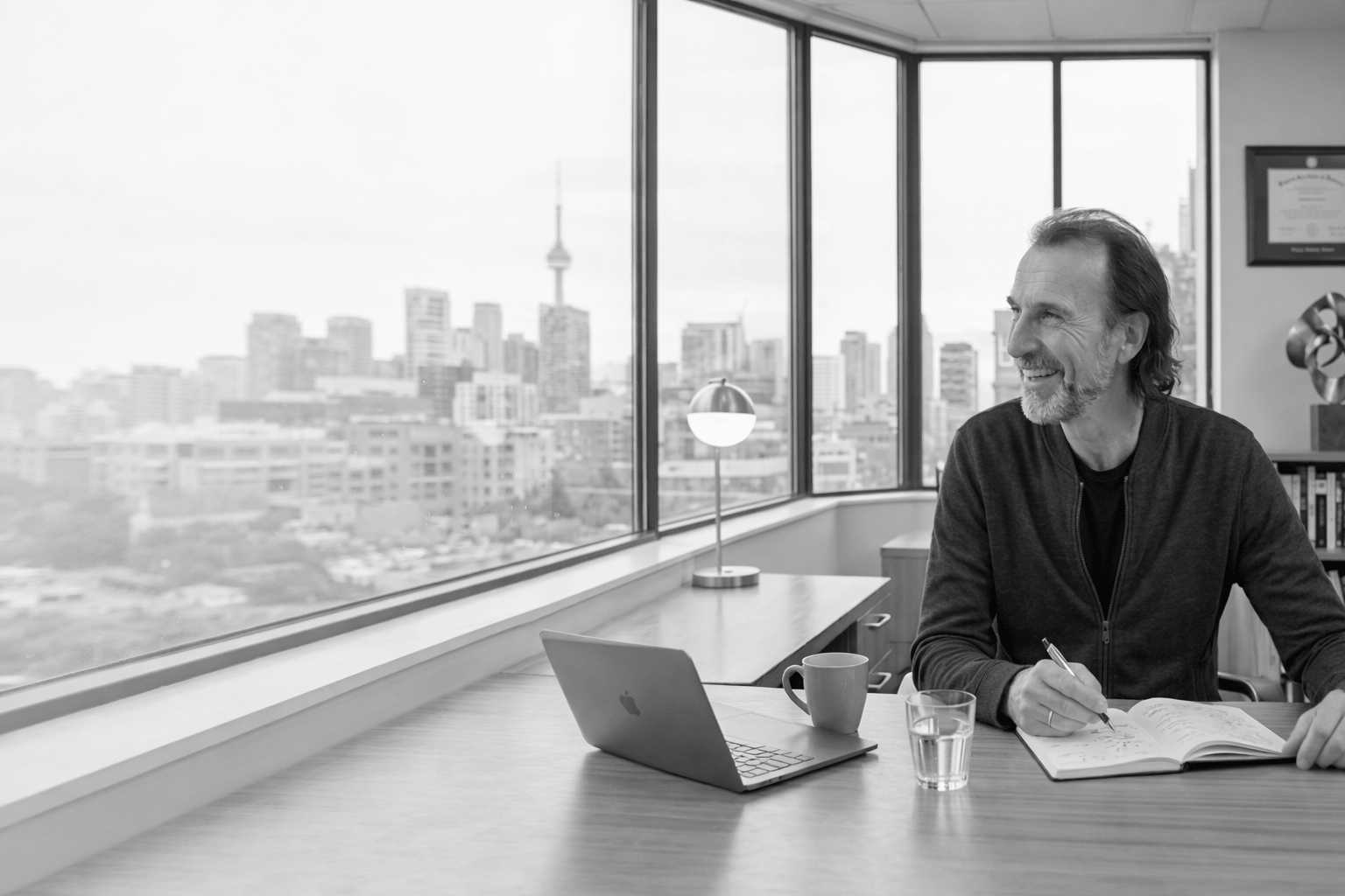 Modern workspace with Toronto view.png