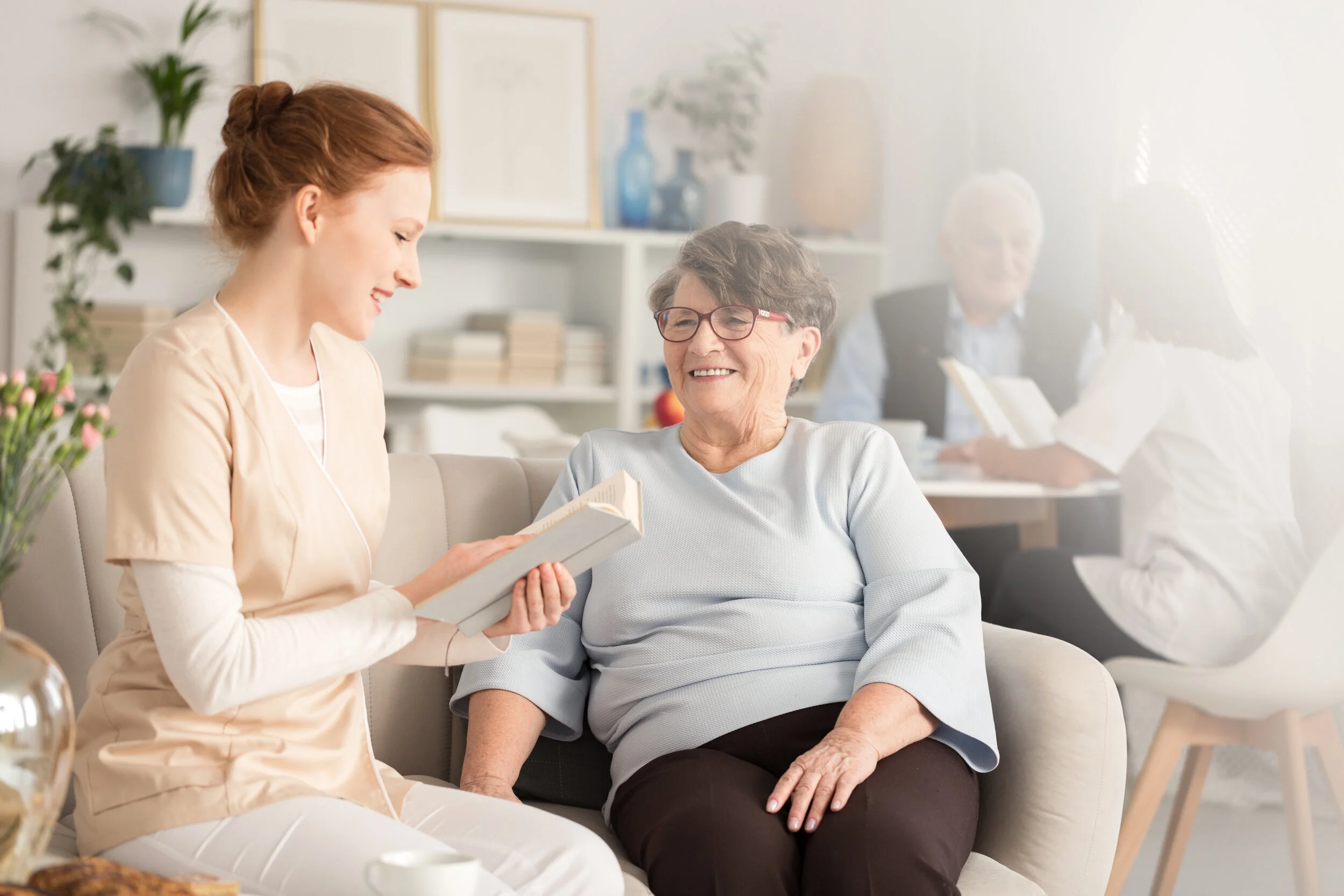 volunteers-reading-books-to-pensioners-PJ8SFNC copy.jpg