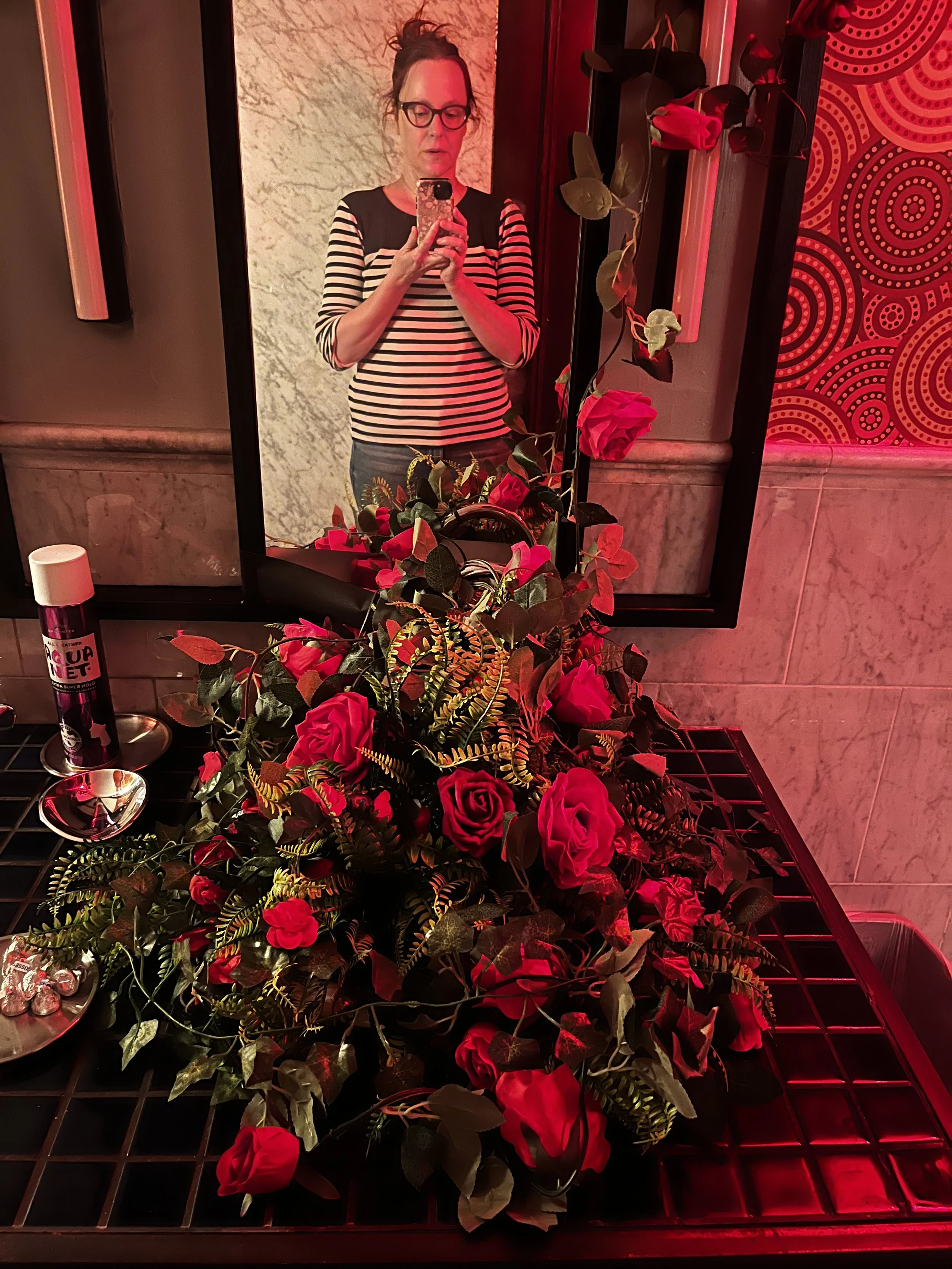 faux rose installation in an out of order sink for Third Rail Project's True Love Forever (hello again from the mirror)