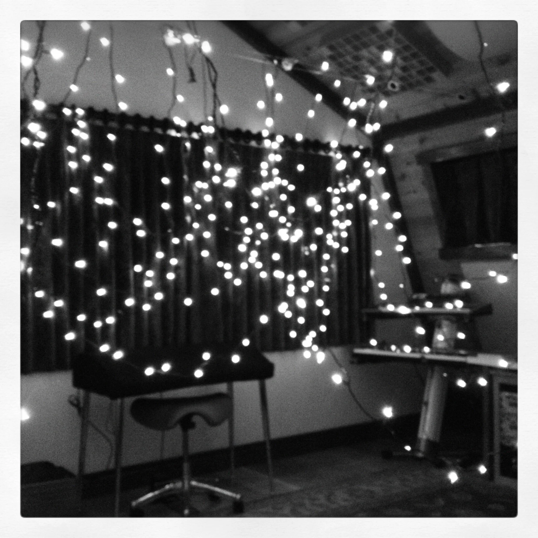 I hung Christmas lights all over the music studio for the video shoot.  They were a beautiful nuisance!
