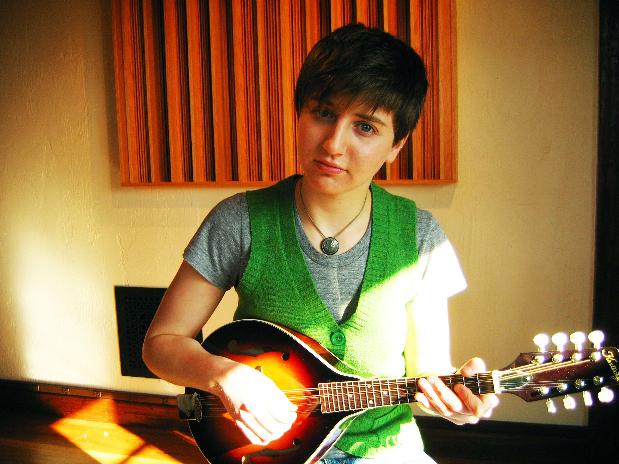 I used to wear a lot of vests.  I think this was an Ellen DeGeneres inspired trend.