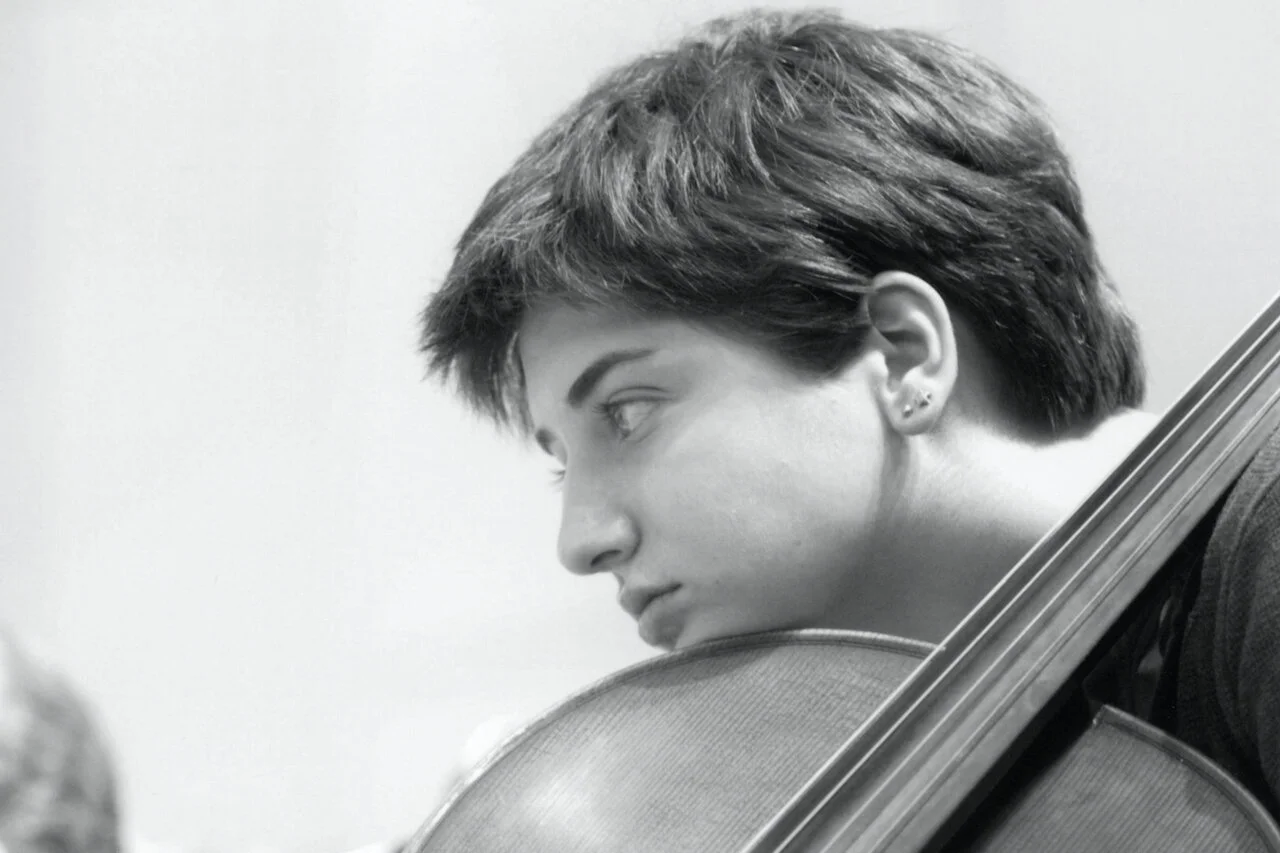 My cello and I hanging out at orchestra rehearsal.  I’m impatiently awaiting my post high school freedom.