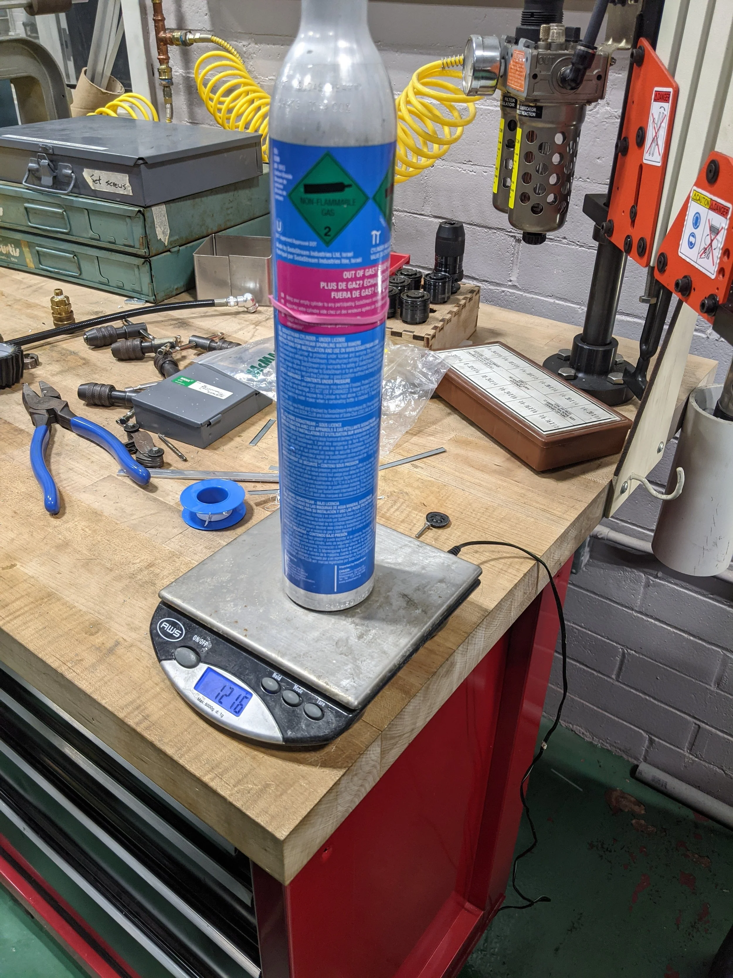 Massing a cylinder to measure volume