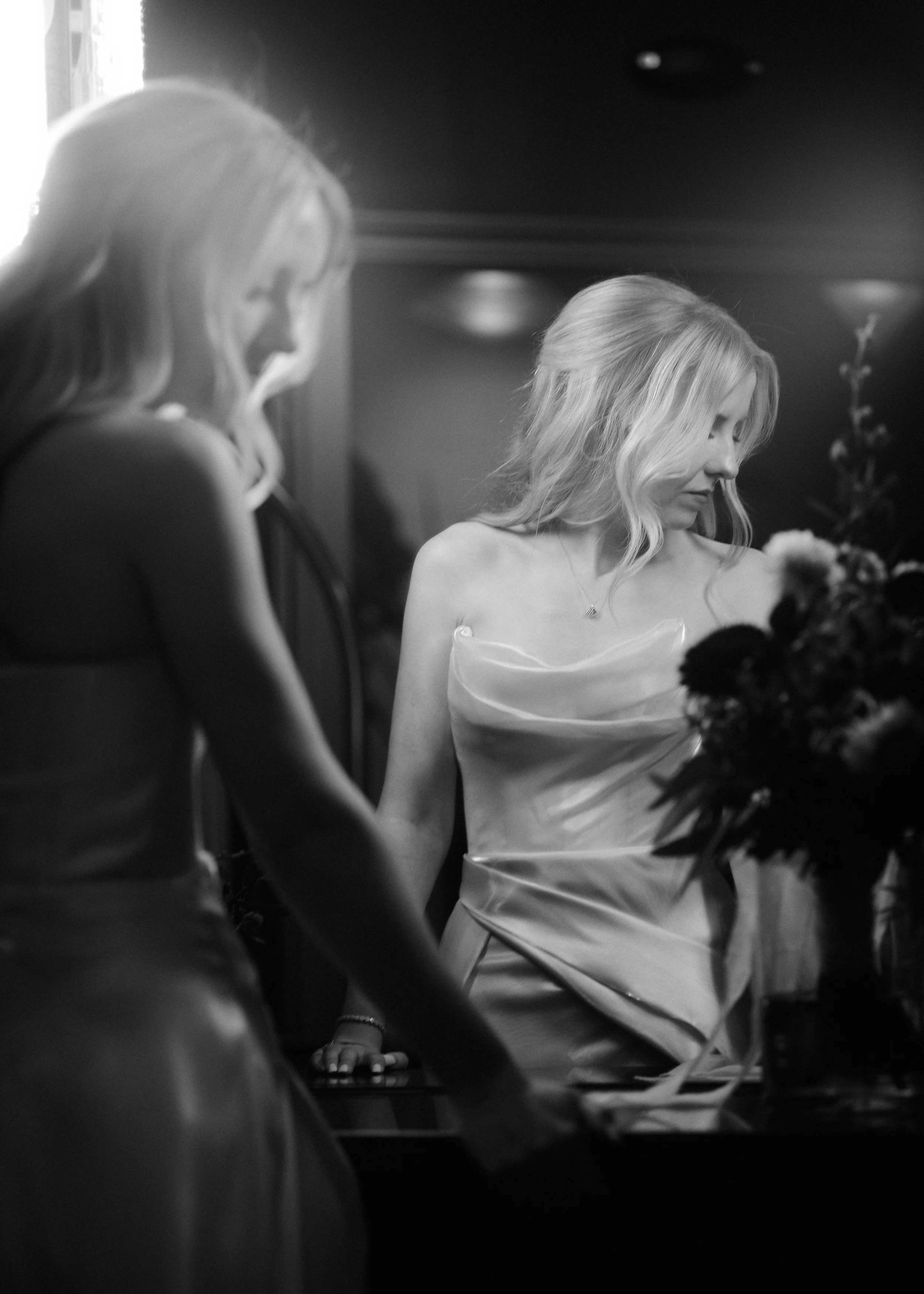 a bride photographed through a mirror with lens flare, wedding photographed at Planterra wedding venue in West Bloomfield, Michigan.