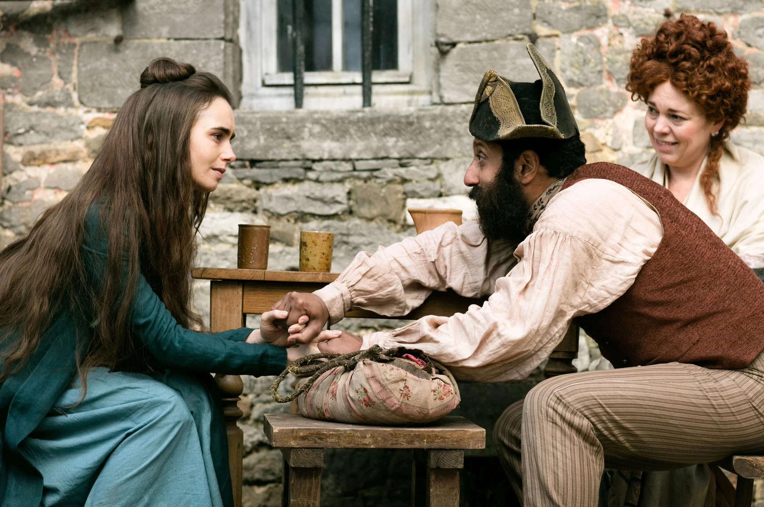 Lily Collins, Adeel Akhtar and Olivia Colman in a still from BBC’s Les Misérables (Image: Lookout Point)