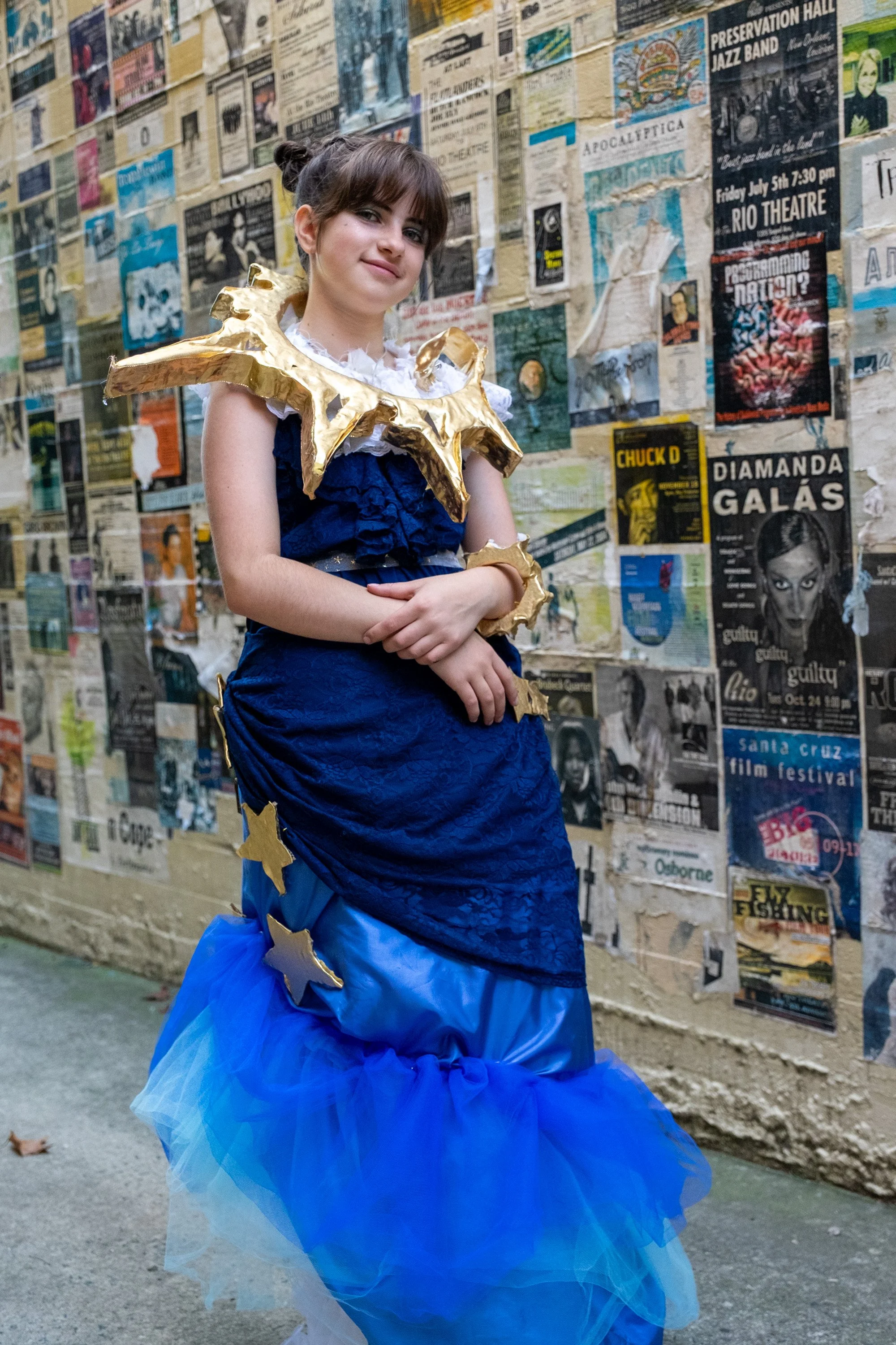 FashionTeens Santa Cruz student model wearing a gown made from 20 pairs of thrifted denim jeans, inspired by Marie Antoinette, on the runway