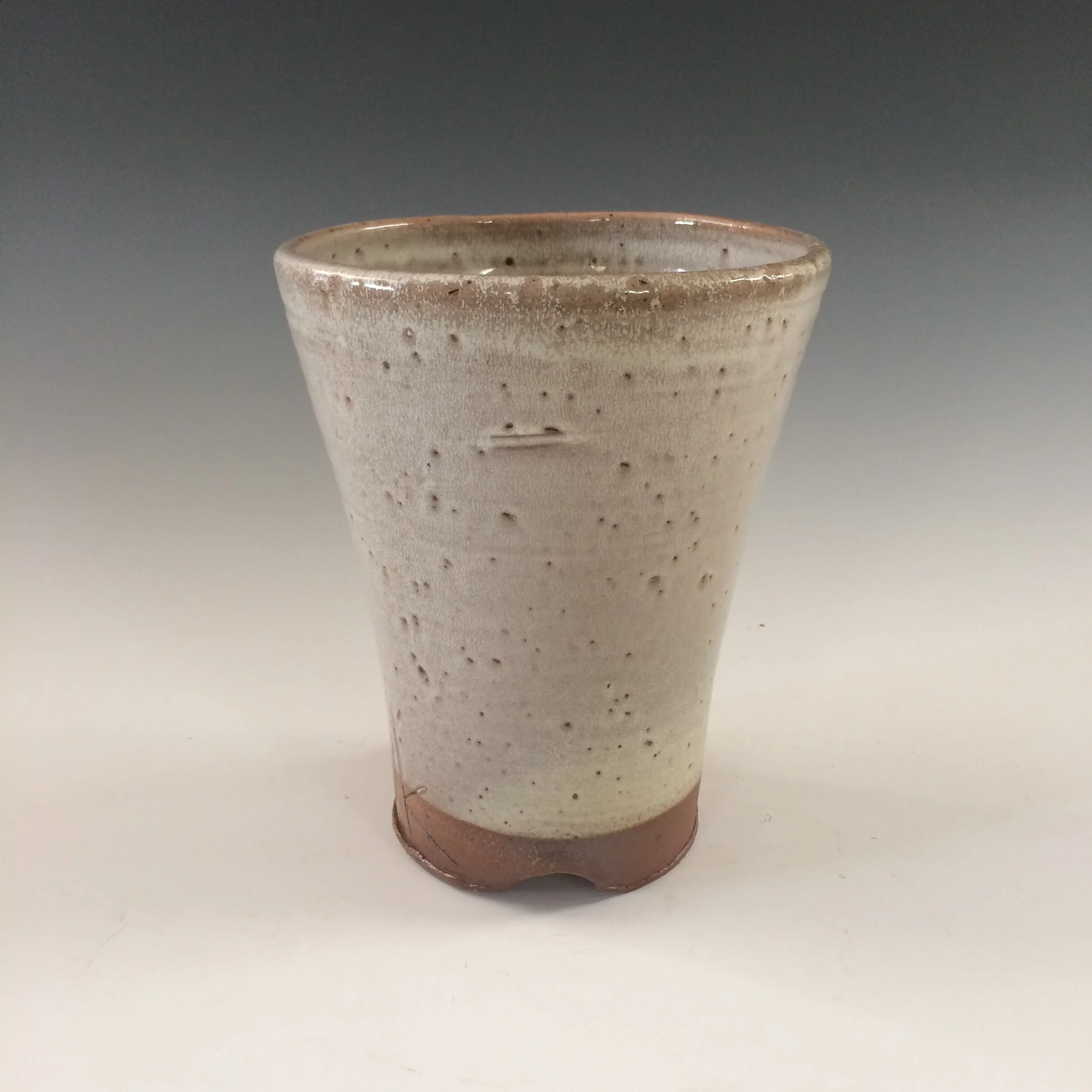 Flared white vase - dented base