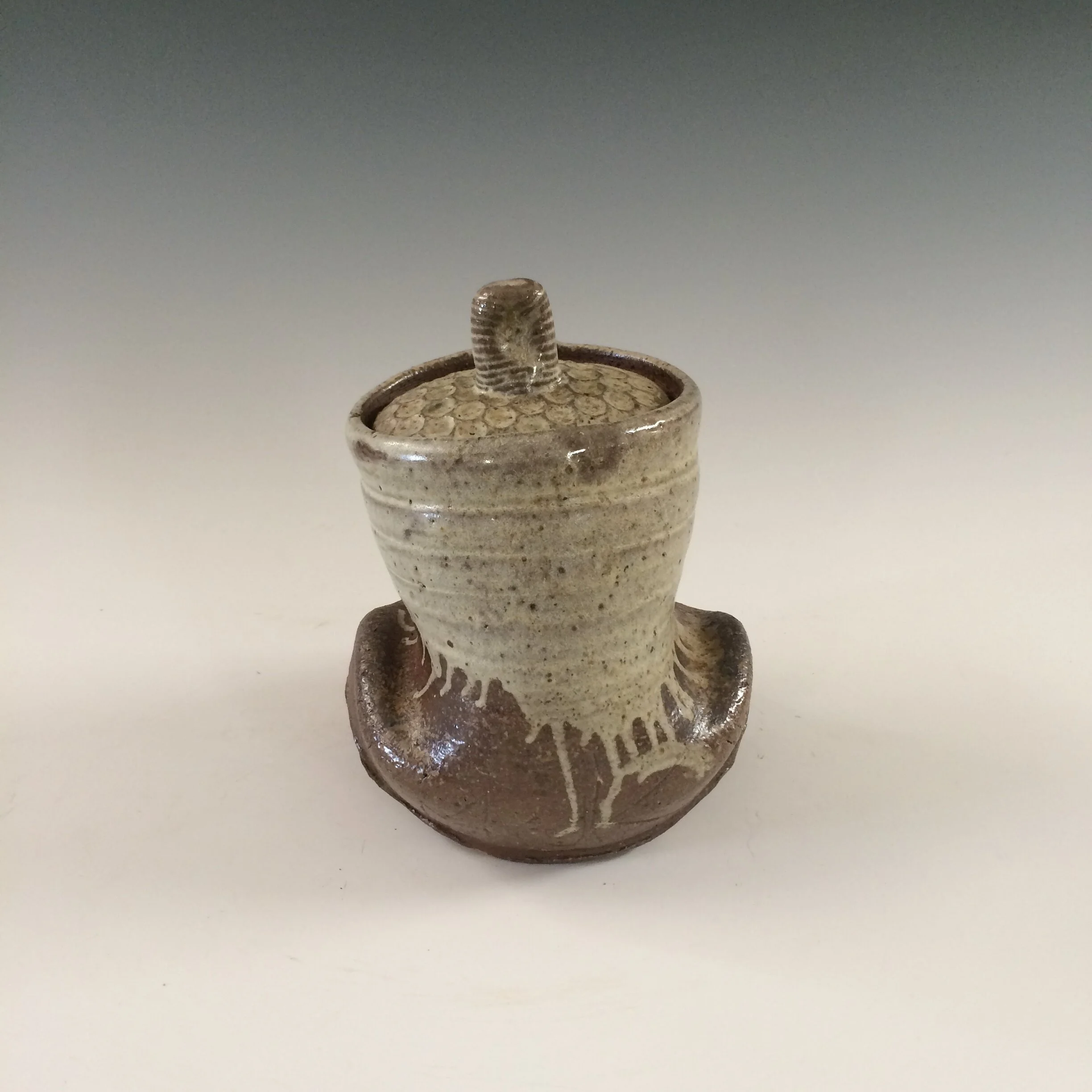 Contorted lidded jar