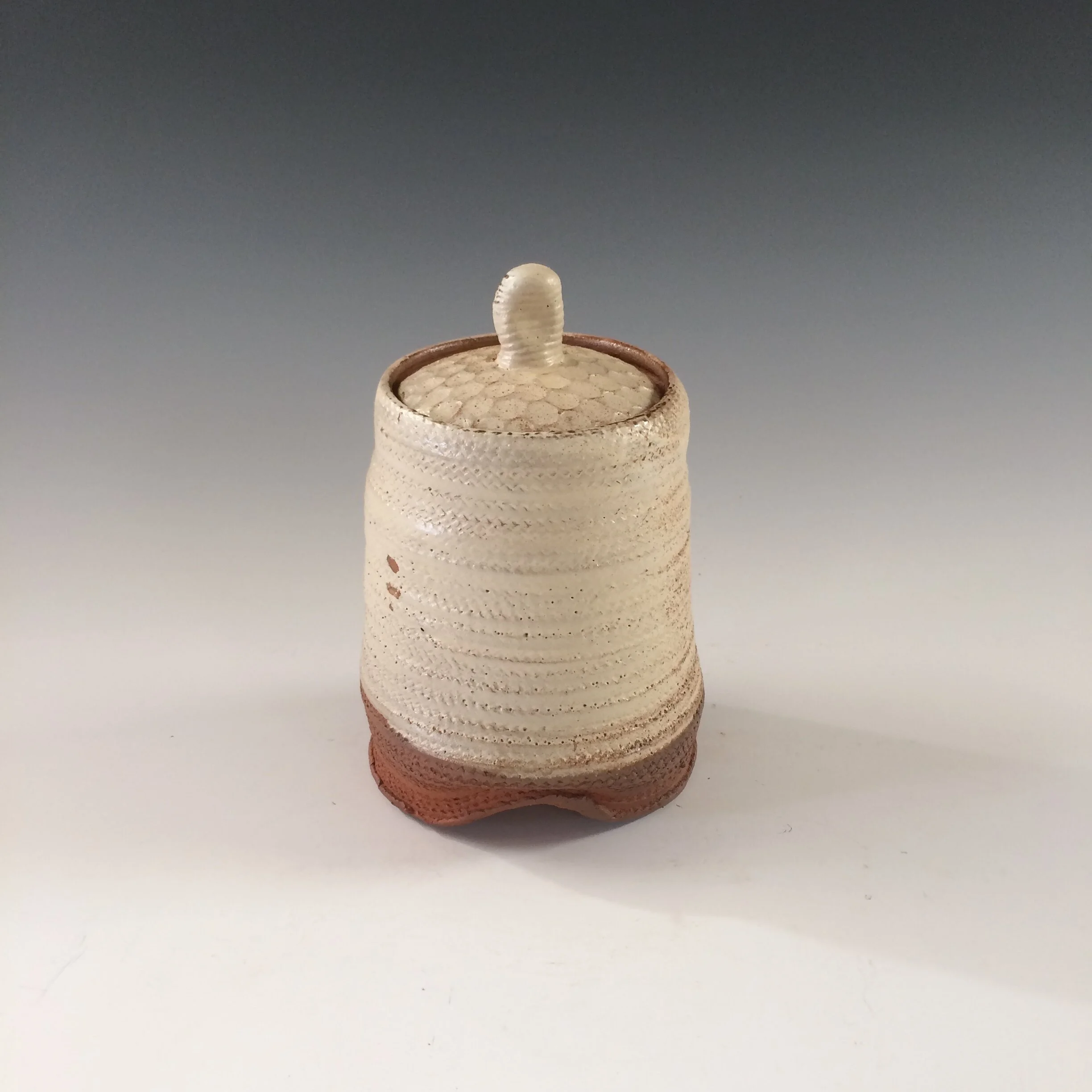 Lidded jar - squashed knob
