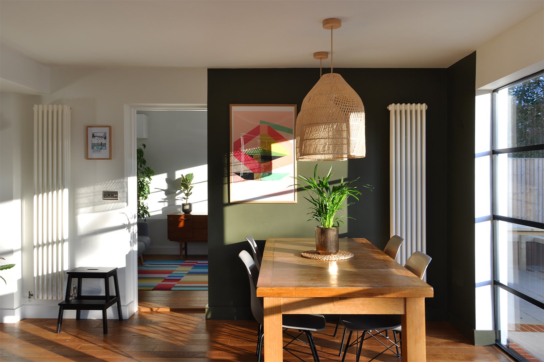 CharlotteBucciero-Interiors-green-wall-dining-living-wood-oak-table.jpg