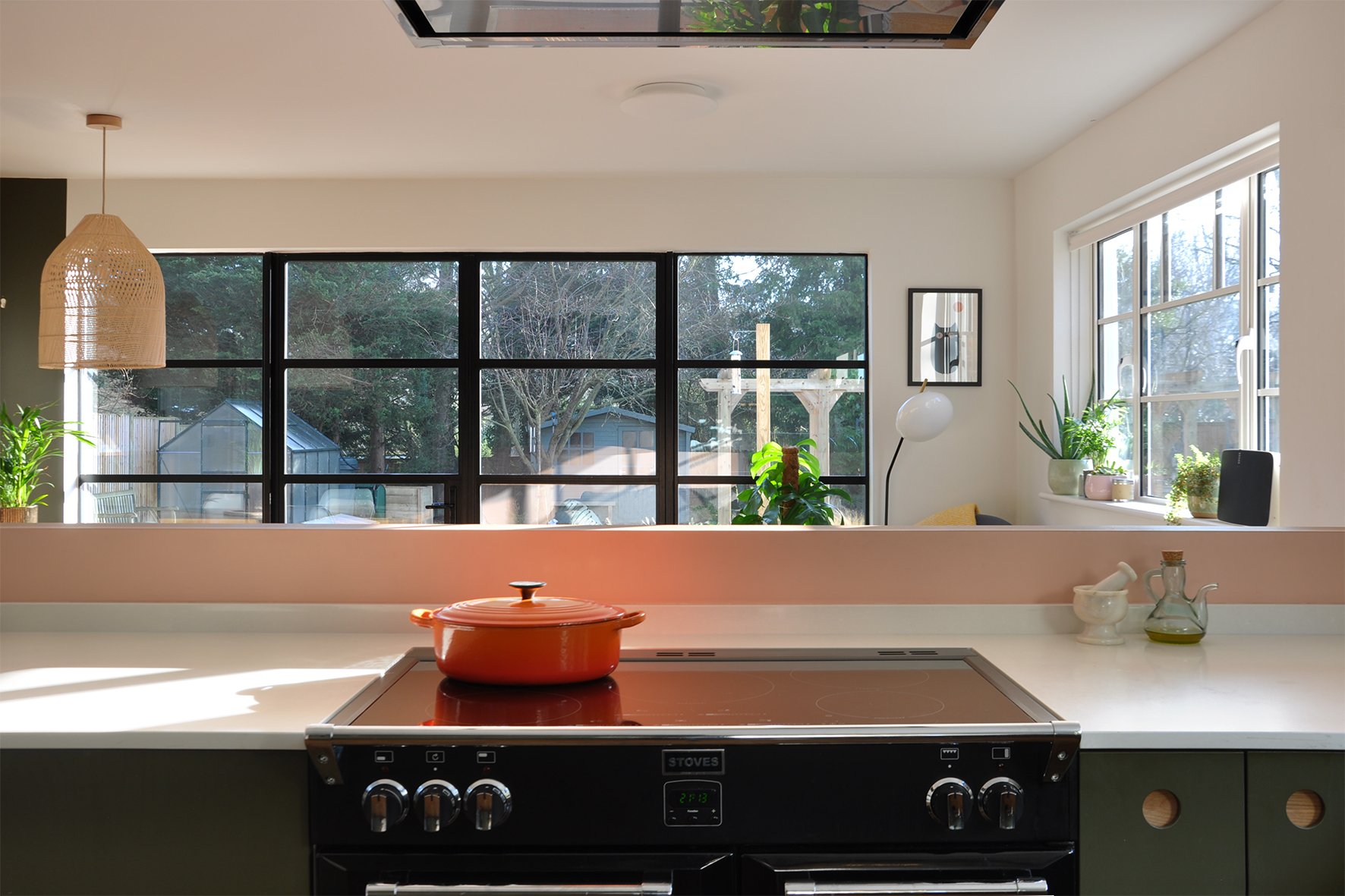 CharlotteBucciero-Interiors-kitchen-hob-living-rattan-pendant-metal-windows.jpg