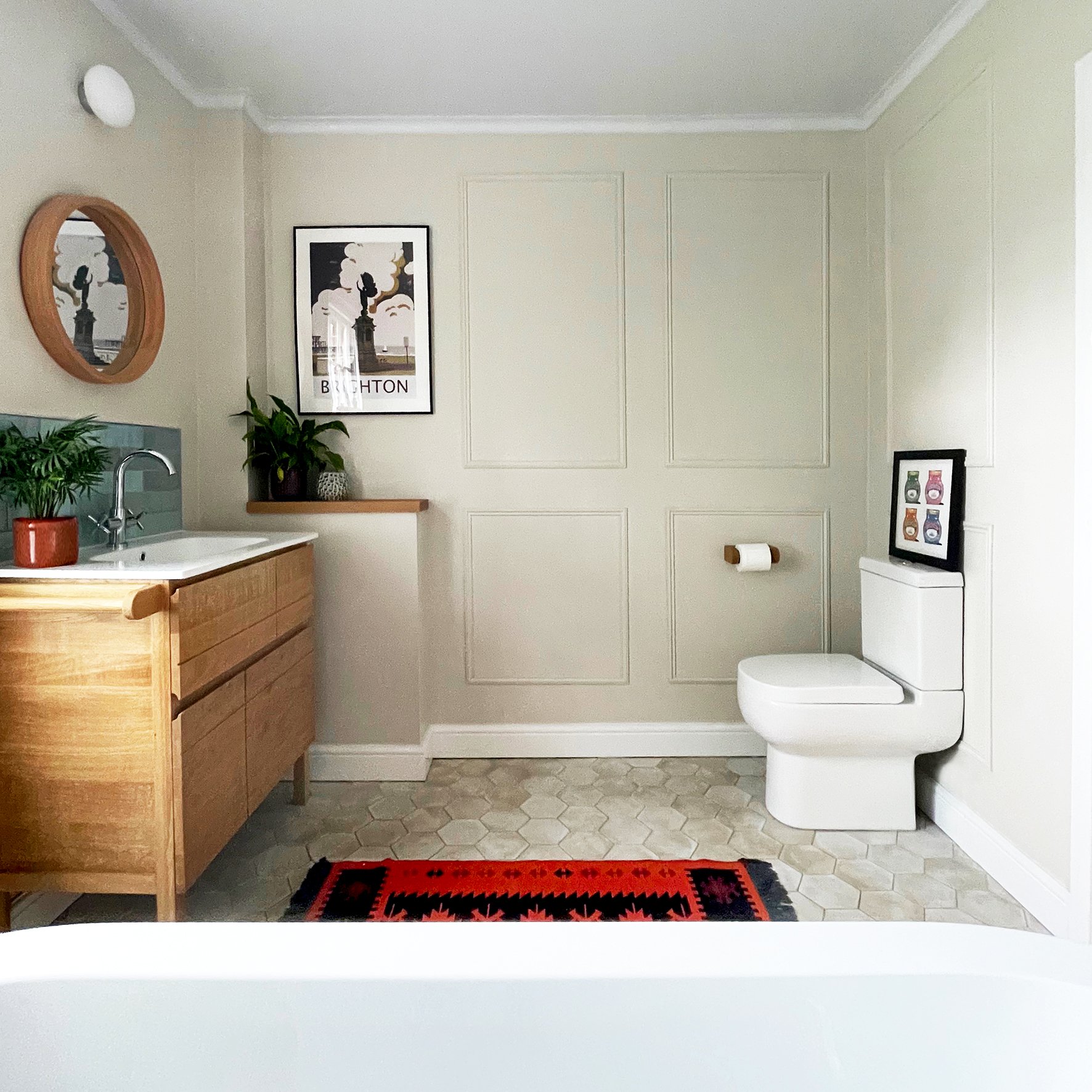 CharlotteBucciero-Interiors-Bathroom-cream-panneling-bespoke-sink-cupboard-blue-splashback.jpg