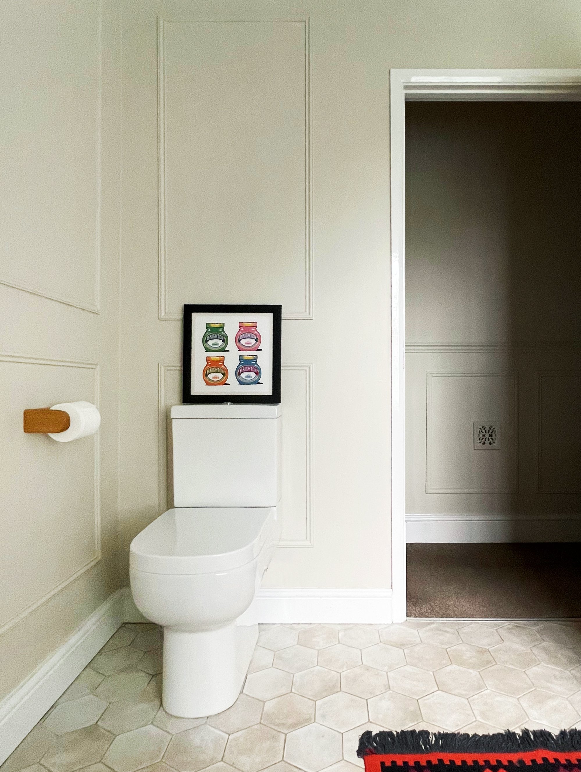 CharlotteBucciero-Interiors-bathroom-remodel-panneling-beige-toilet-stone-tile.jpg