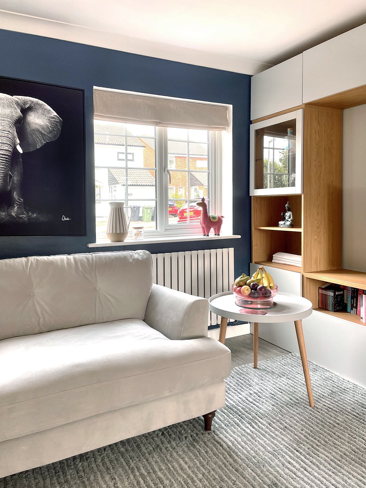 CharlotteBucciero-Interiors-Living-room-mediawall-blue-wallpaint-sofa-design.jpg