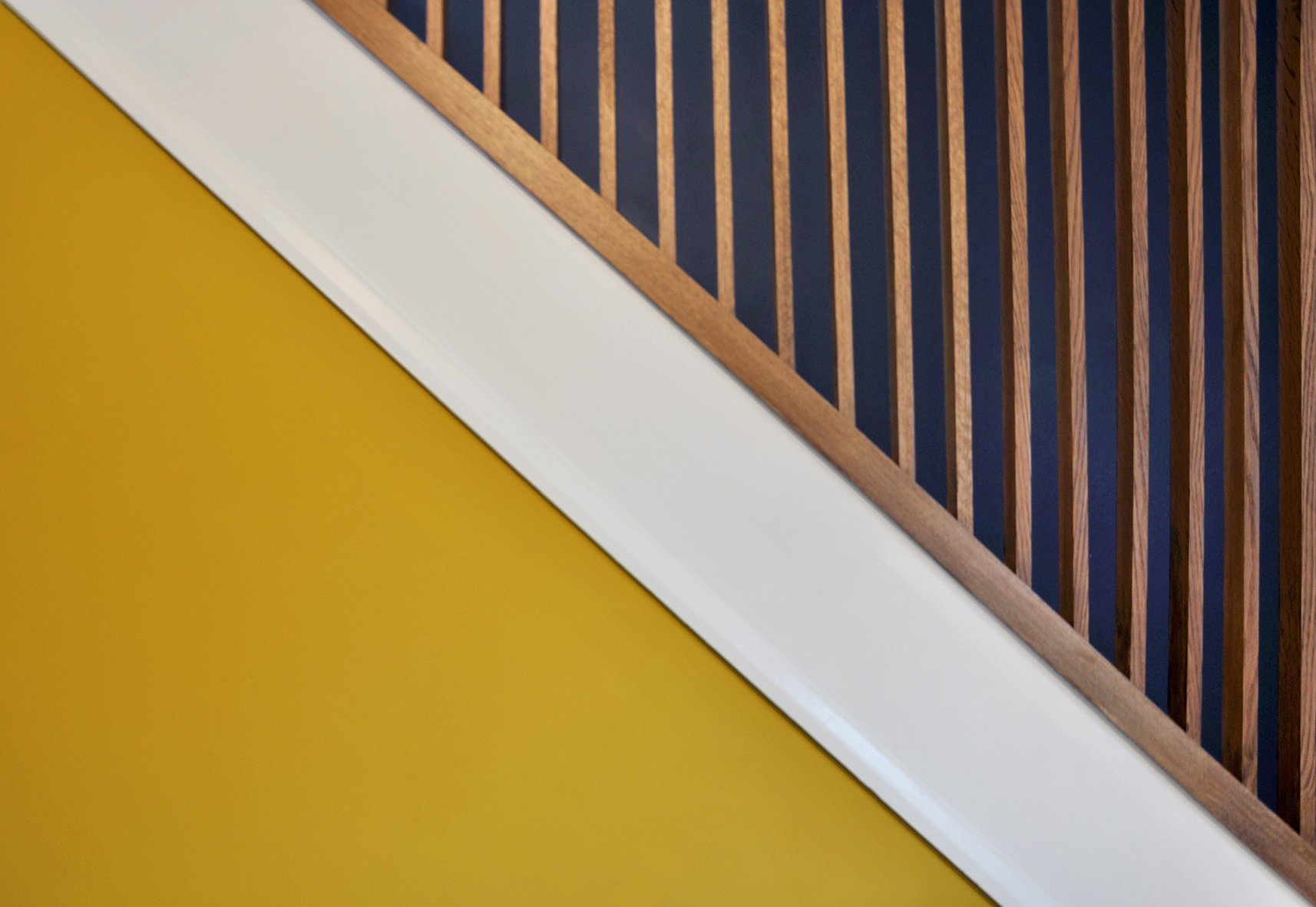 CharlotteBucciero-Interiors-yellow-wall-staircase-oak-beam-details.jpg