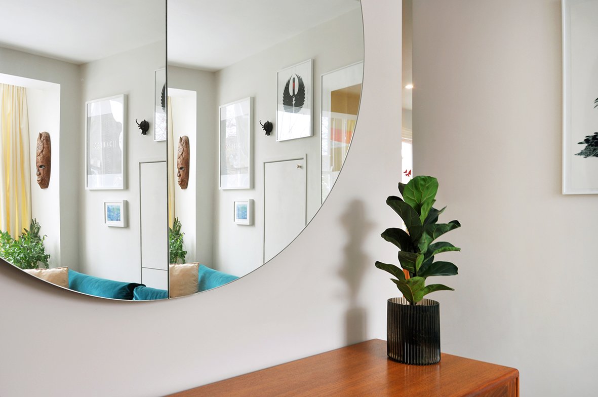 CharlotteBucciero-Interiors-Livingroom-sideboard-design-house-plant-white-art.jpg