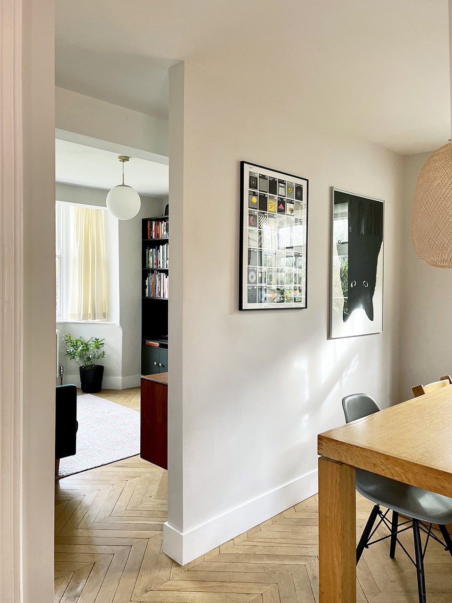 CharlotteBucciero-interiors-wallpaint-beige-bookshelf-pendant-light.jpg