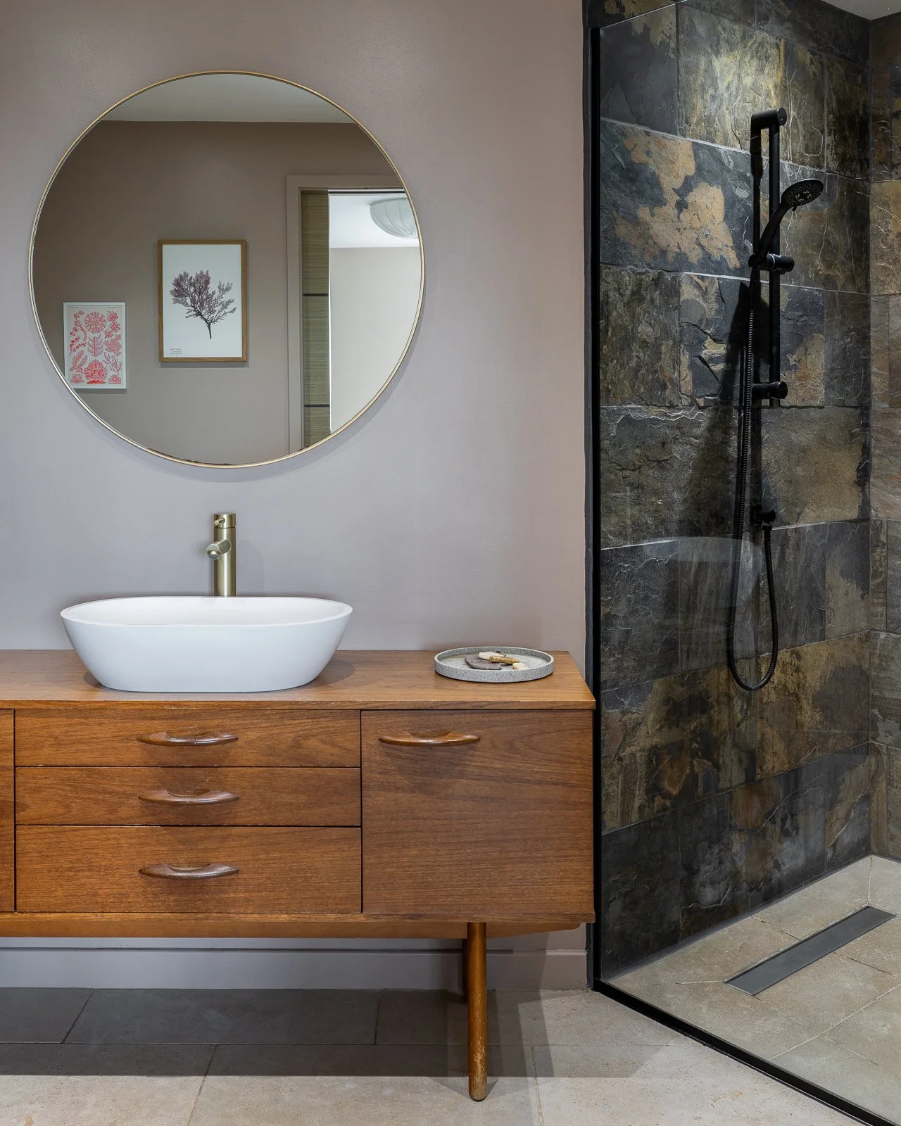 bathroom-round-mirror-midcentury-sideboard-vanity-charlotte-bucciero-interiors.jpg