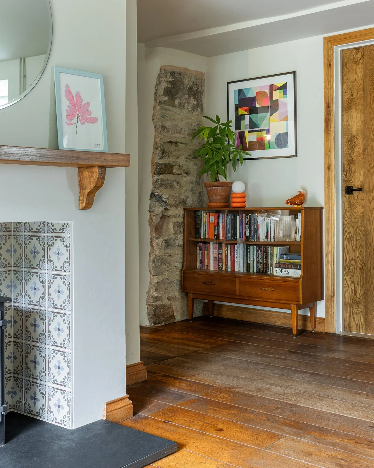 fireplace-tiles-stone-walls-shelves-charlotte-bucciero-interiors.jpg