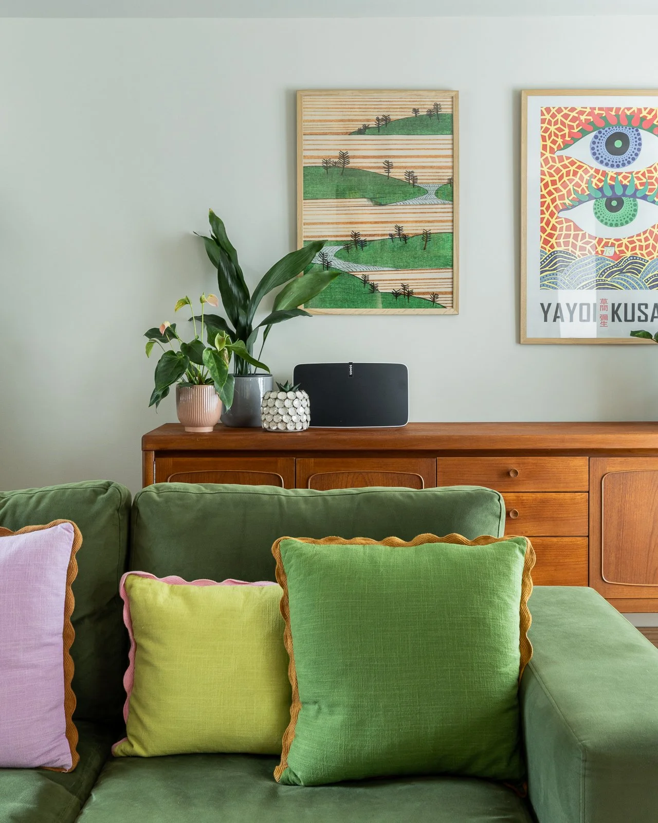 green-sofa-cushions-sideboard-art-plants-charlotte-bucciero-interiors.jpg