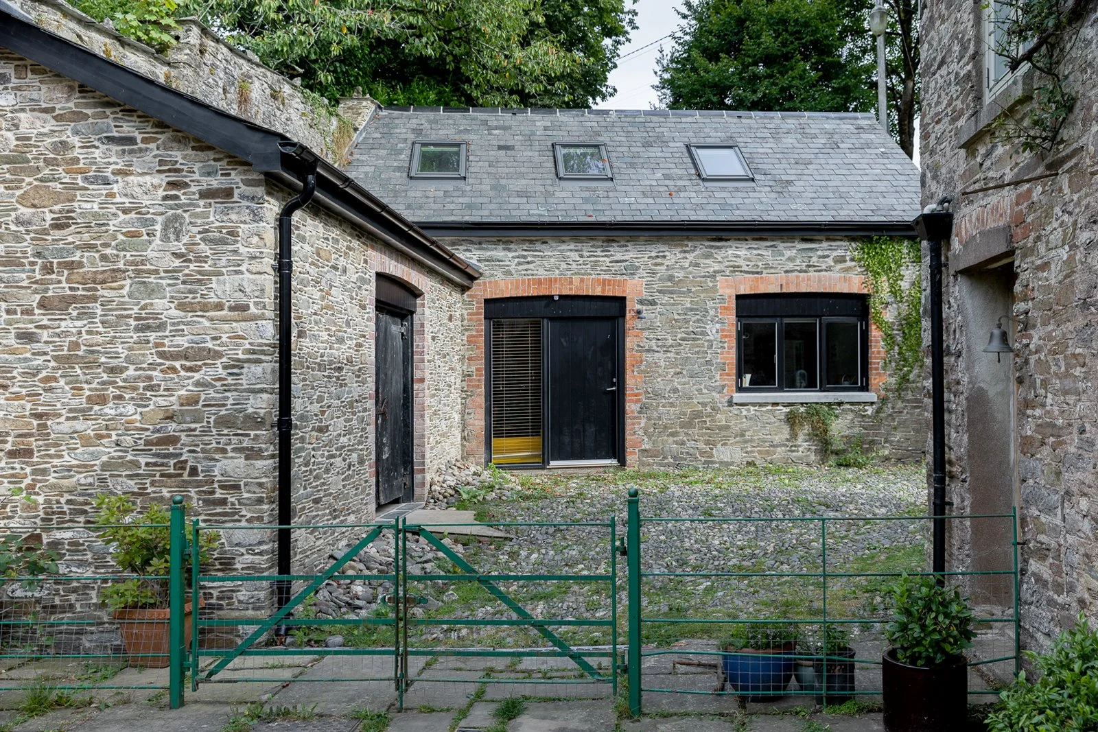 stone-barn-accessable-courtyard-charlotte-bucciero-interiors.jpg
