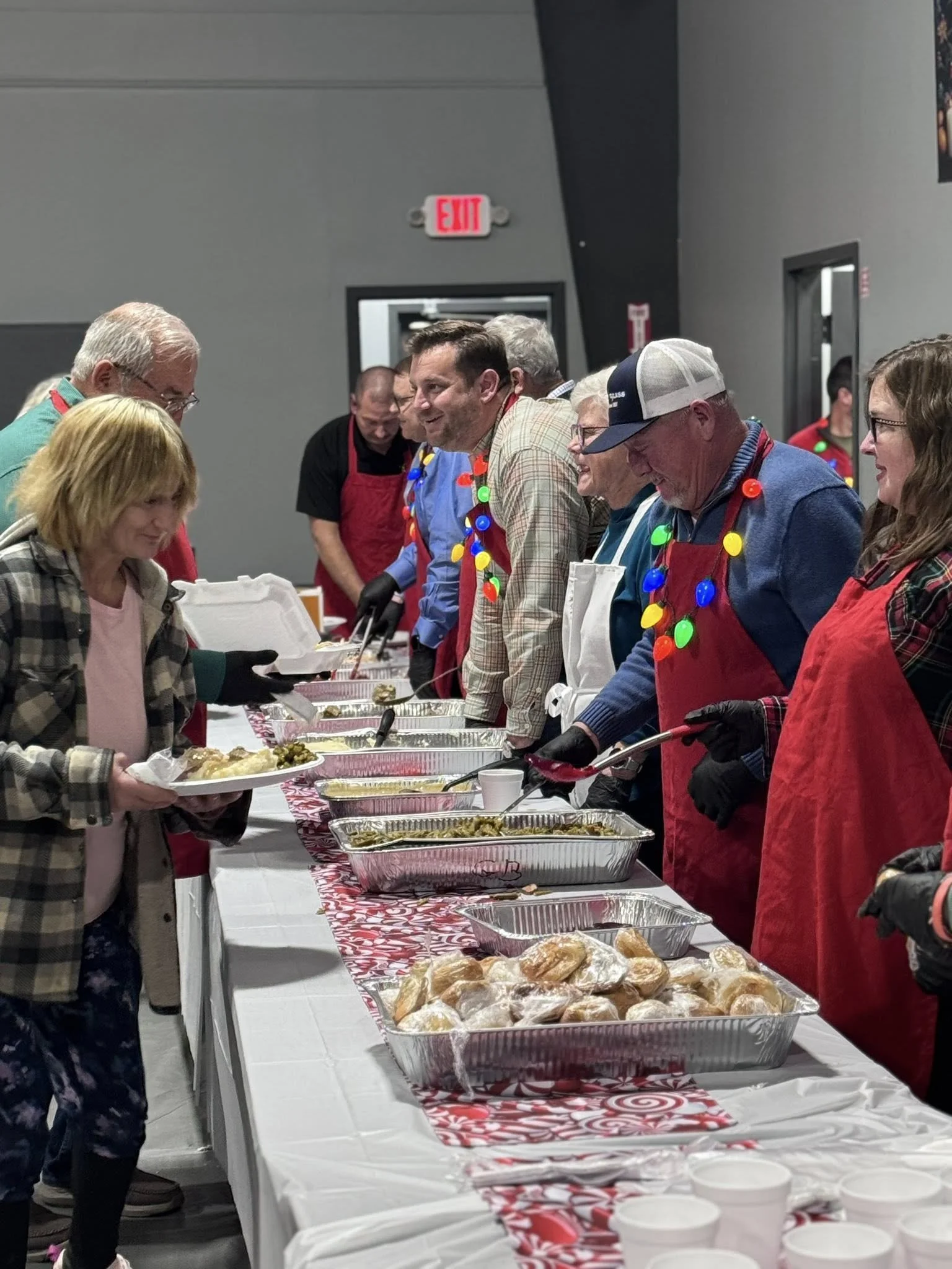 Rowan County's elected officials serving meals at the Annual City-County Christmas Dinner