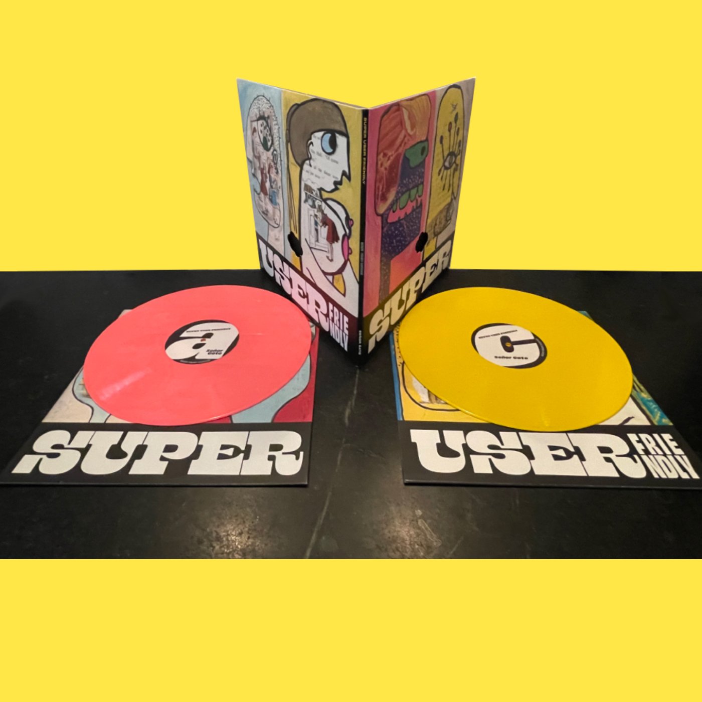 gatefold_with discs on blk and yellow.jpg